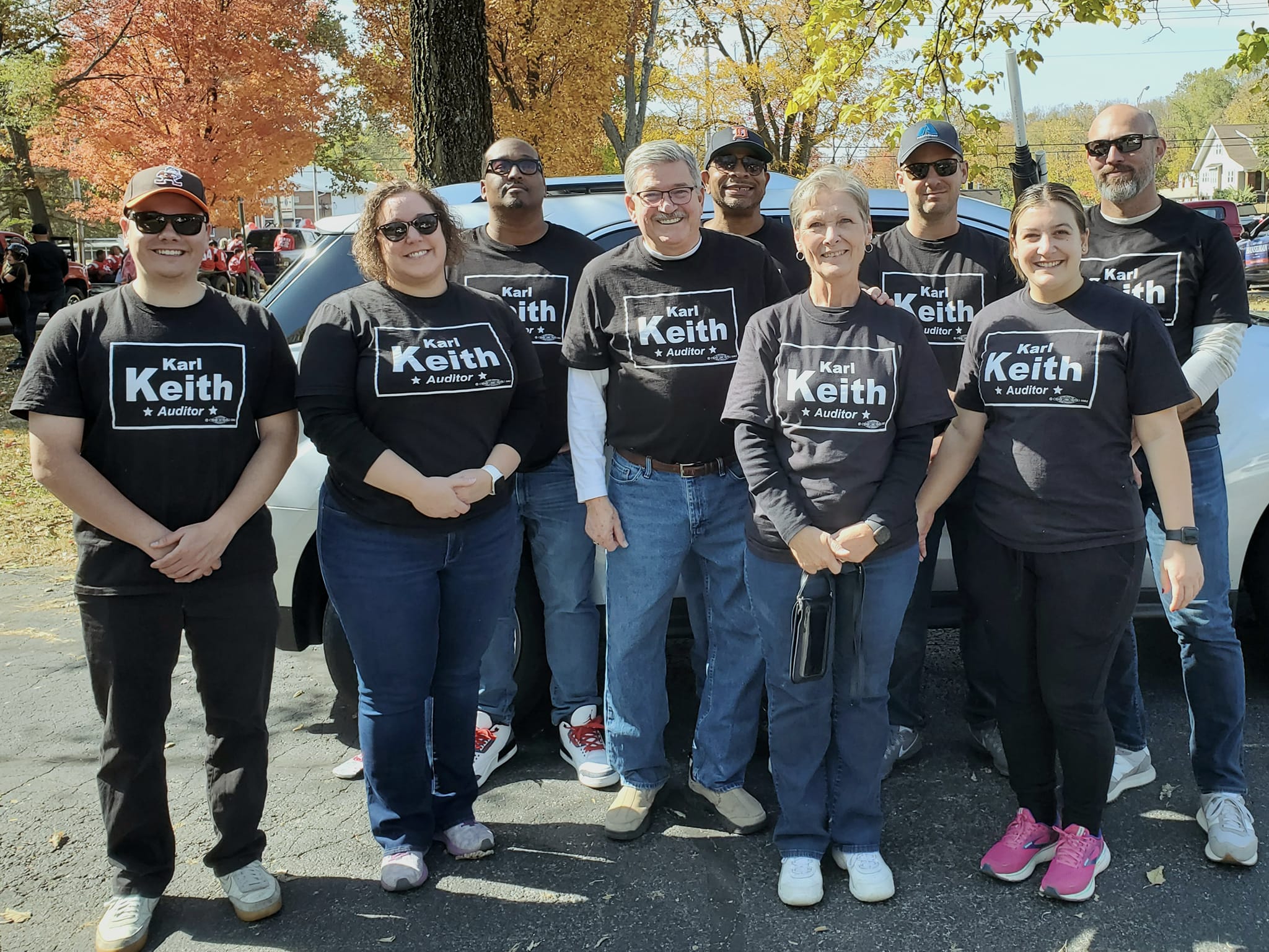 Karl Keith with campaign supporters wearing Karl Keith Auditor shirts